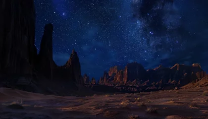 Poster Starlit sky above rocky desert landscape at night. © Kent Kreative Kit 