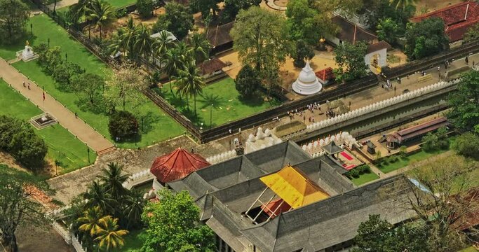 Kandy Sri Lanka Aerial v13 close up birds eye view drone flyover prominent pilgrimage destination, historical site the sacred city, temple of sacred tooth relic - Shot with Mavic 3 Cine - April 2023
