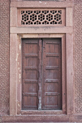 Agra, Uttar Pradesh / India - February 8, 2012 : An architectural detail of the door at Tomb of Akbar.