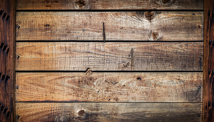 vintage wood background texture with knots and nail holes; old wooden rustic planks wall