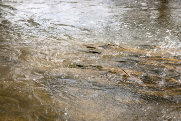 background with abstract water patterns - water flowing in the river - 744248688