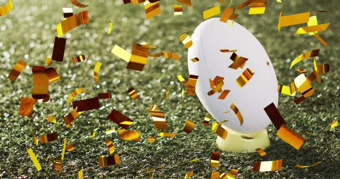 Animation of confetti over white rugby ball on grass