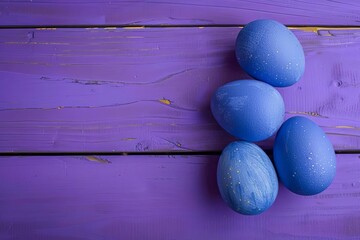 Blue easter eggs artfully placed on a vibrant purple wooden table Creating a striking contrast and visual appeal