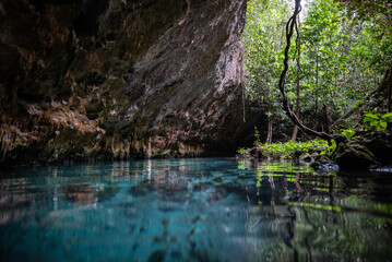 Underground caving and swimming in Sac Actun cave system in Tulum Mexico