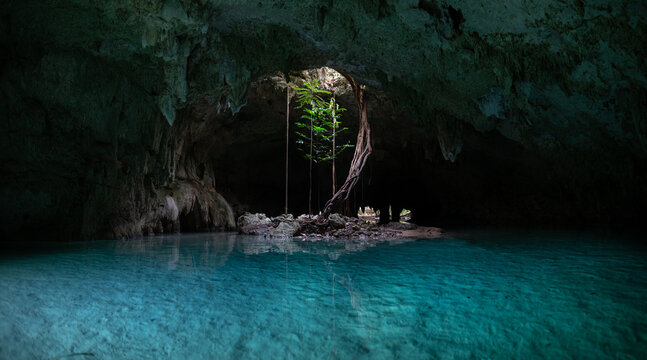 Underground caving and swimming in Sac Actun cave system in Tulum Mexico