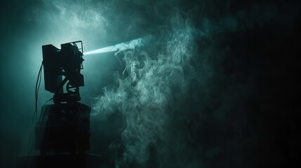 Movie projector on a dark background with light beam