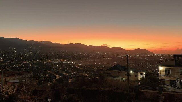 Timelapse footage from night to dawn over city of Kingston, Jamaica