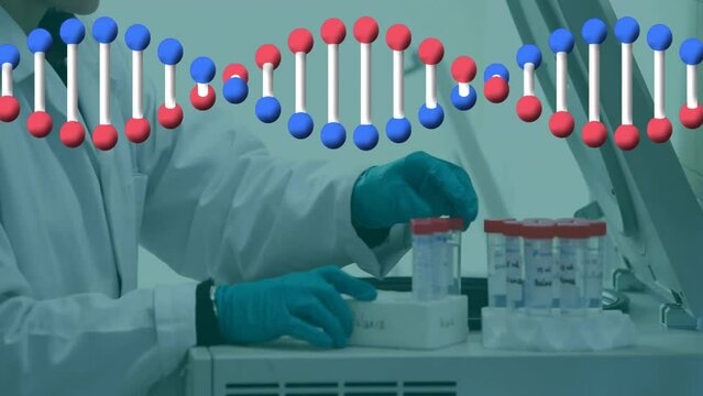Animation of dna strand and data processing over male scientist in laboratory
