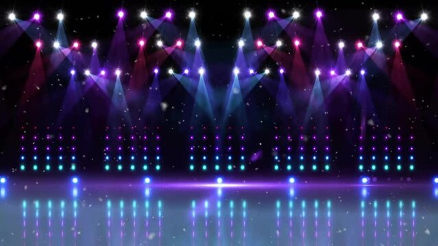 Animation of snow falling over purple and pink spotlights and banks of lights over empty stage