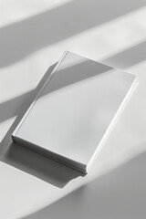 Blank Hardcover Book on White Table