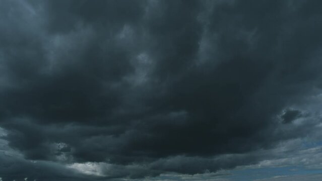 Black Of Rainstorms Clouds. Cumulonimbus Clouds Moving In Cloudy Dark Sky. Dramatic Thunderstorm Cloudscape.