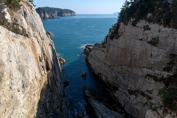 Fototapeta na wymiar View of the seaside with cliffs and rocks