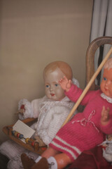 Old retro kinds puppets in forgotten from time kids shop close up background high quality big size print