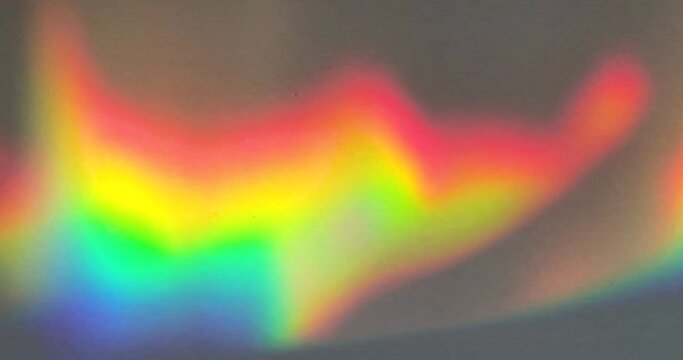 Organic rainbow prism creates colorful wavy pattern for background element