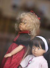 Old retro kinds puppets in forgotten from time kids shop close up background high quality big size print
