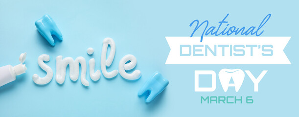 Opened tube and word SMILE written with toothpaste on blue background