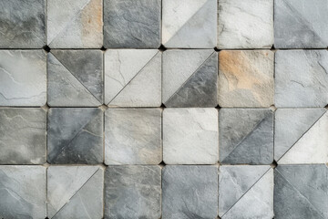A close-up and top view of stone tile patterned floor, with elegant white and light gray texture...