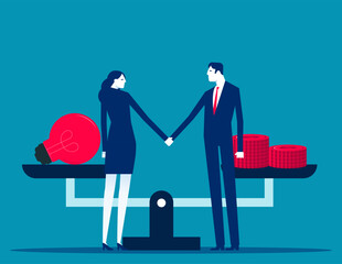 Two business person shake hands to make a deal on the background of scales