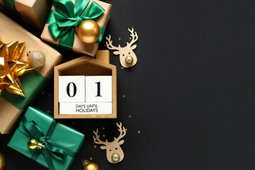 Countdown calendar with Christmas decorations and gift boxes on black background