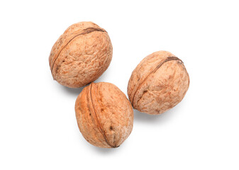 Whole walnuts on white background