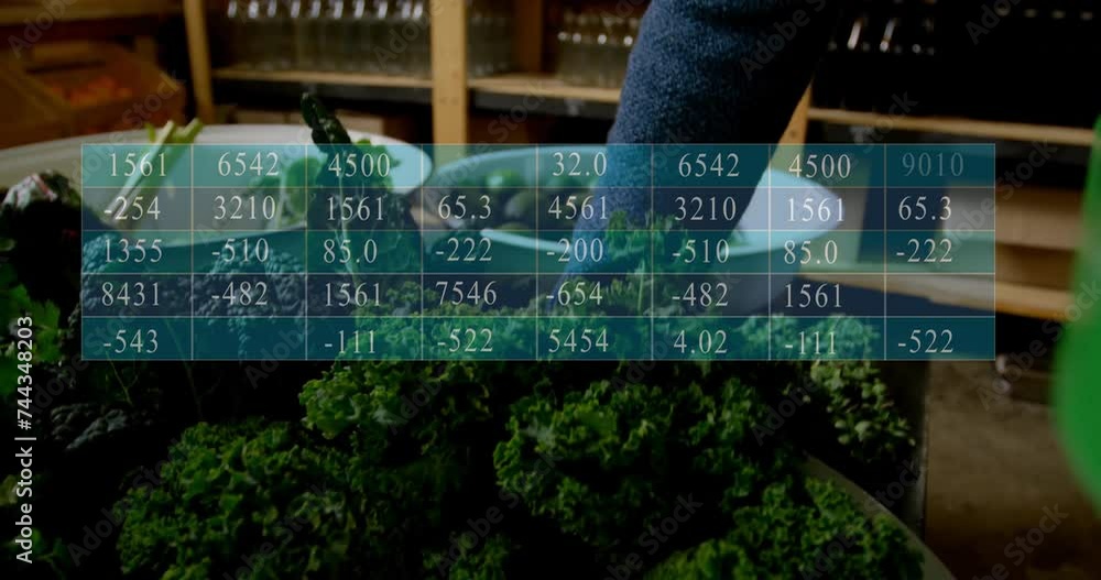 Poster animation of data processing on table over caucasian man picking vegetables