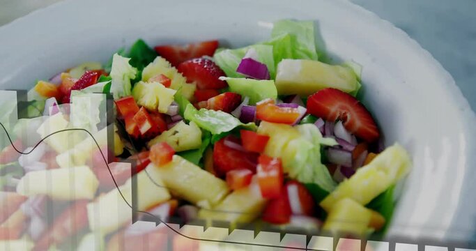 Animation of data processing and diagrams over fresh fruit salad