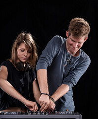 Joyous DJ moment captured in shared smiles