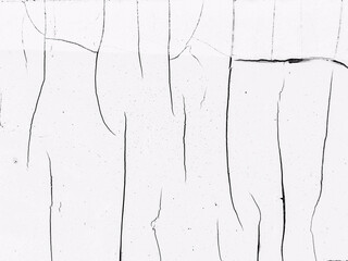 White cracked paint texture on a rough surface