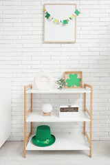 Shelving unit with decorations for St. Patrick's Day celebration in living room