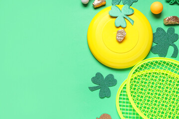 Sports equipment and decorations for St. Patrick's Day celebration on green background