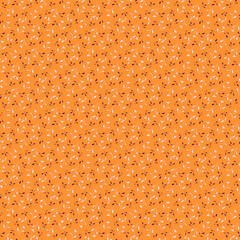 Floral fabric pattern with white and brown twigs and leaves isolated on a bright yellow background