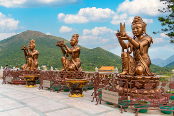 Statues presenting gifts to the Tian Tan Buddha, Ngong Ping, Lantau Island