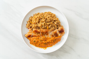 grilled chicken steak with red curry sauce and rice