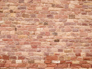 Seamless texture of a red brick wall, perfect for backgrounds