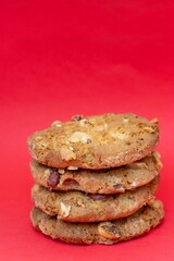Peanut Cookies or Biscuit Isolate on Red Background in Vertical Orientation