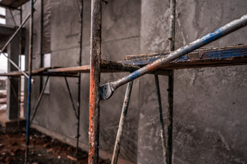 Metal Bars Wood Planks Concrete Building Outdoor Construction Side of House Outside Winter