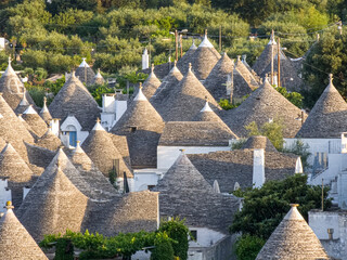 Alberobello Italy - traditional trulli houses with conical stone roofs. Famous landmark, travel...
