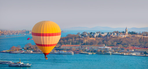 Hot air balloon flying over the Topkapi palace - Istanbul, Turkey