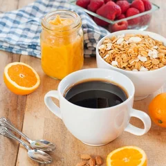 Fotobehang Table Breakfast - Continental Breakfast, fruit, cereals and orange juice © Ioan