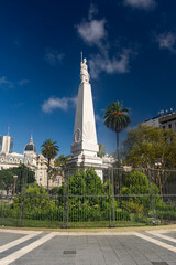 Obraz premium Beautiful view to white monument with statue in Plaza de Mayo