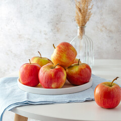 ripe red apples on the table