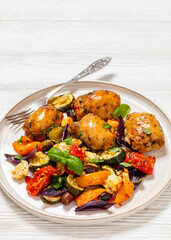 baked chicken thighs with veggies, olives, feta