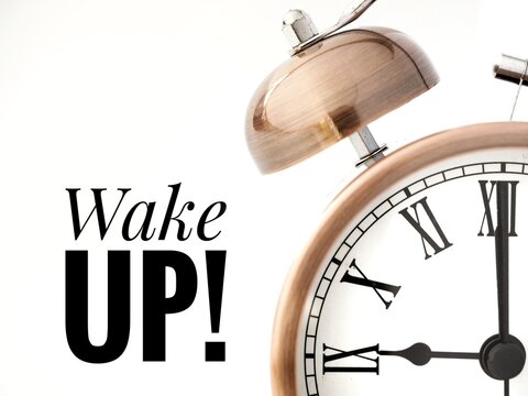Wake up background with text and bell alarm clock at 9am