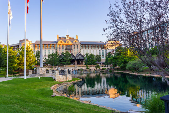 Gaylord Texan Resort building and a flag view point in sunset in Grapevine, Dallas, Texas