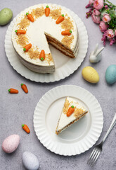 Homemade Easter carrot cake made with walnuts, iced with cream cheese. Sweet dessert.