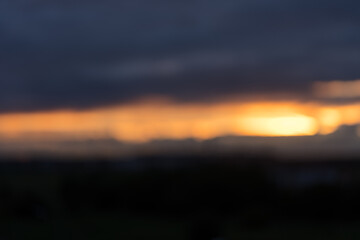 Bokeh defocused background of yellow sunset