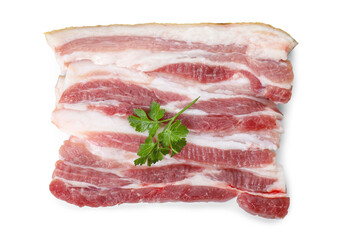 Obraz premium Pieces of raw pork belly and parsley isolated on white, top view