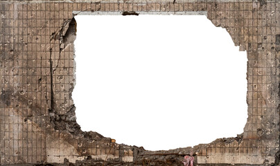 Explosion hole in ceramic tiled concrete wall isolated on white background with copy space in...