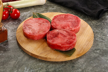Delicous raw tuna medallion for cooking