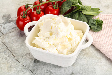 Soft cream cheese in the bowl
